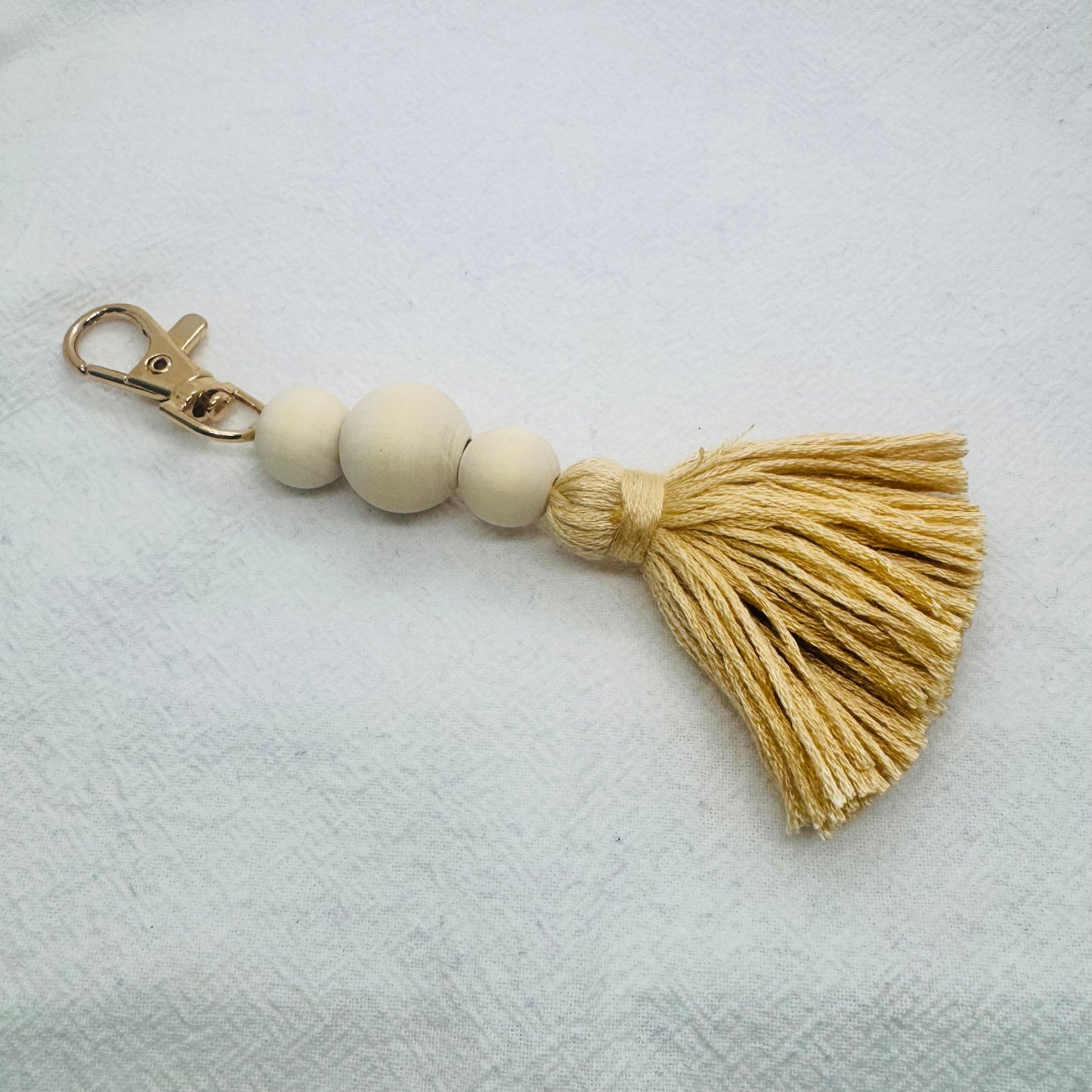 Keychain with beige Tassel and beads