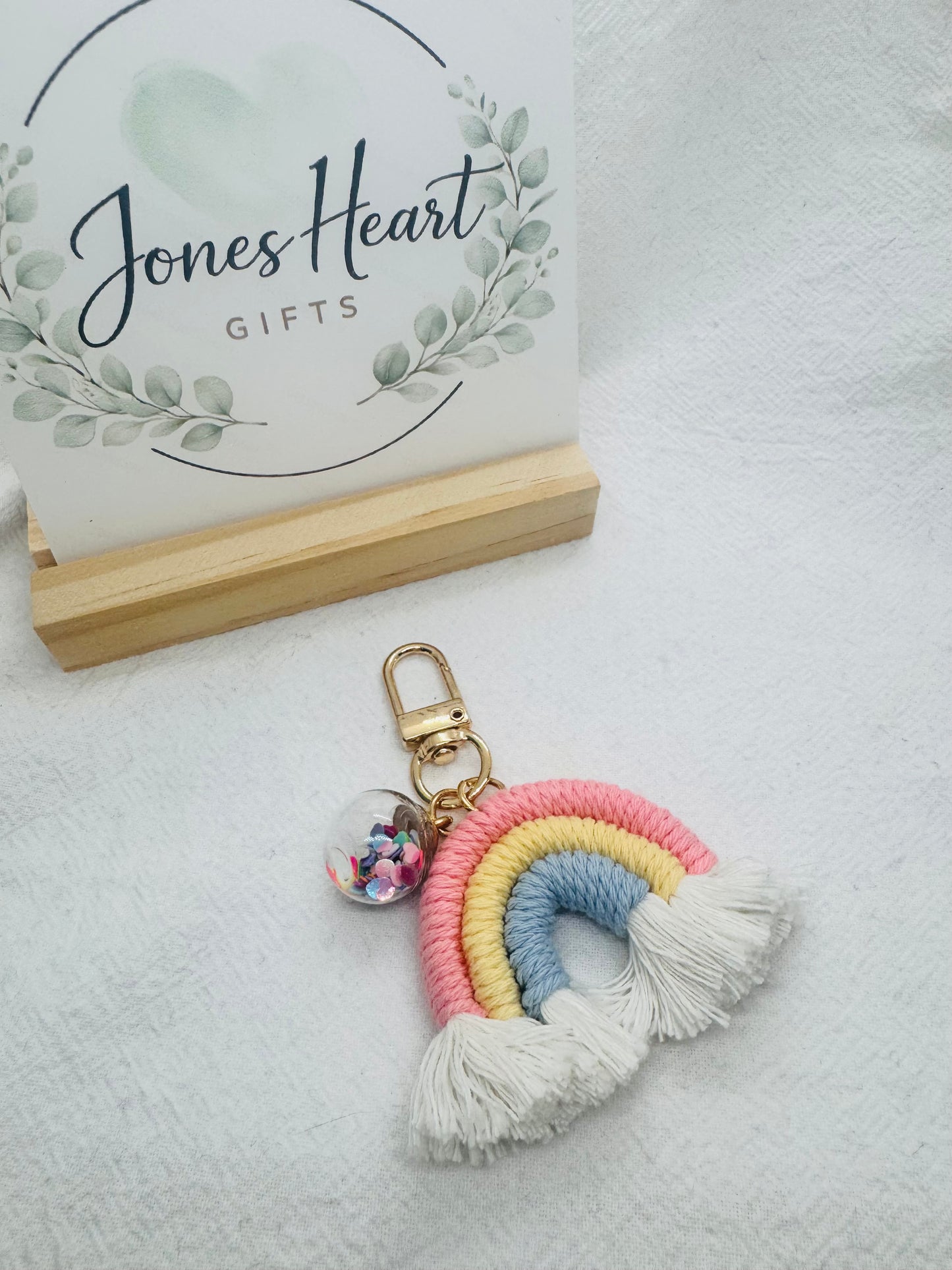 Rainbow-coloured macrame keychain with tassels 